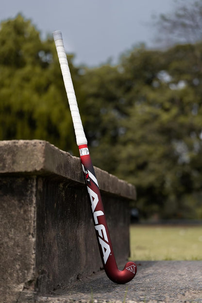 ALFA AX7 Hockey Stick | Color: Red | Sizes : 36.5" | Material: 70% Carbon Composite | Gender: Unisex | Extra Low Bow for Drag Flicks | Optimized Lightweight Design | Durable High-Performance Stick | Versatile for All Playing Styles | Comes with Stick Bag.